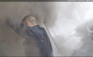 Newly Released Police Video Shows Officers Rescuing Woman from 2021 House Fire