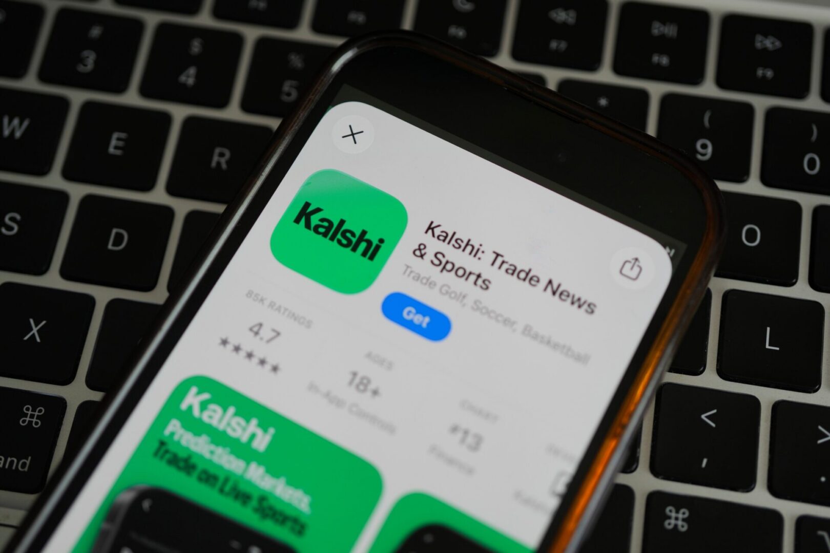 An ad for the prediction market app Kalshi is displayed on a mobile phone Thursday, April 16, 2026.